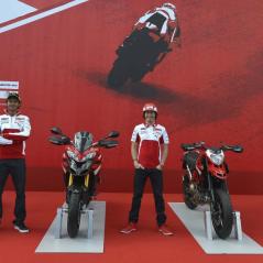 Nicky and Vale pose with a few of Ducati's production models. - Photo: Ducati