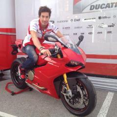 Nicky checks out Ducati's hot new 1199 Panigale outside the hospitality unit. - Photo: Nick Sannen