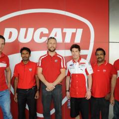 Posing with the staff of the Dubai Ducati Store. - Photo: Marcel Bode
