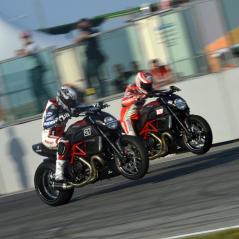 Nicky and Troy Bayliss faced off during the semi-finals of the Ducati Diavel drag race. - Photo: Ducati