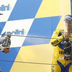 Nicky and Colin Edwards poppin' bottles on the podium in China. - Photo: Hayden archives