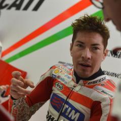 Nicky and Juan discuss the Desmosedici's handling. - Photo: Ducati