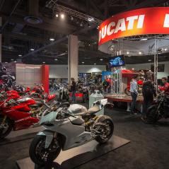 With Nicky's help, the Ducati stand was a hit at the show. - Photo: Ducati